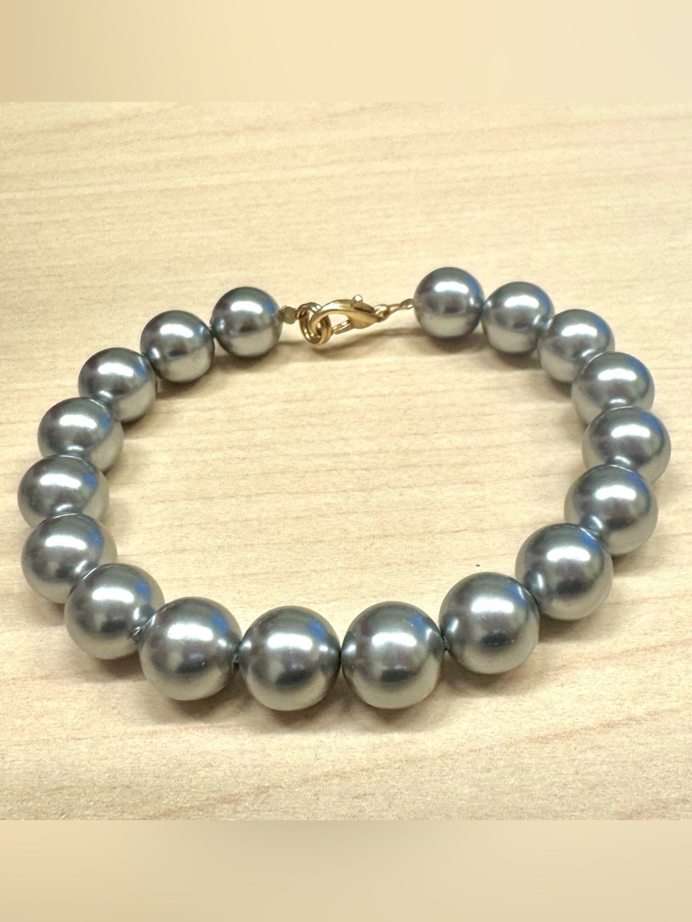 Timeless Silver Mother of Pearl Bracelet with Gold Tone Clasp